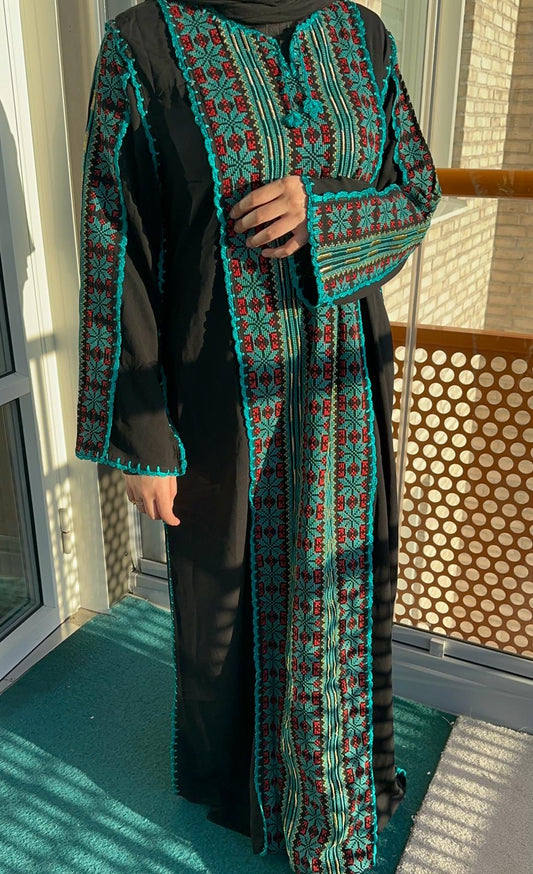 Black-Green Thobe with colorful traditional embroidery.