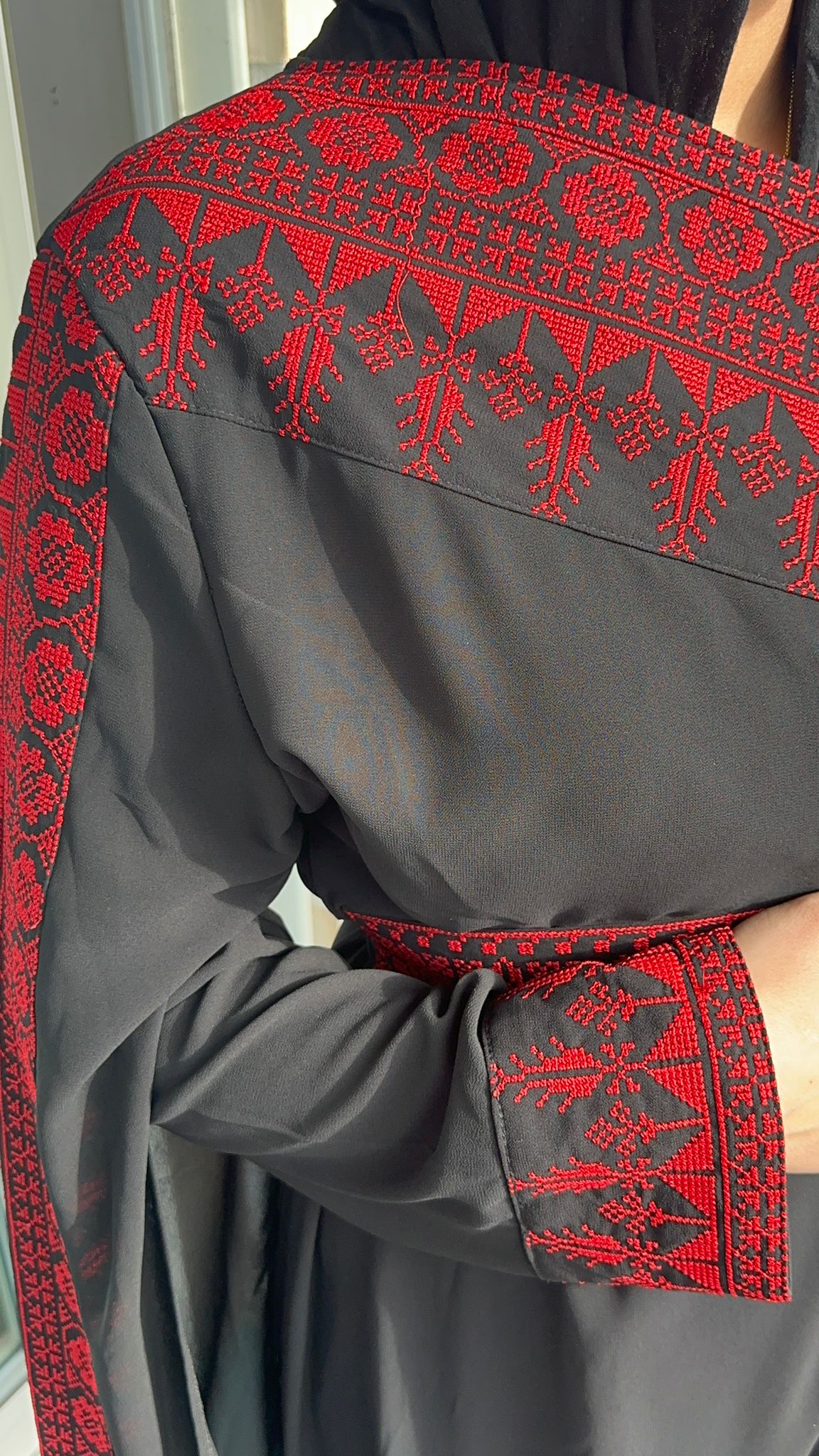 Black Dress with red traditional embroidery.