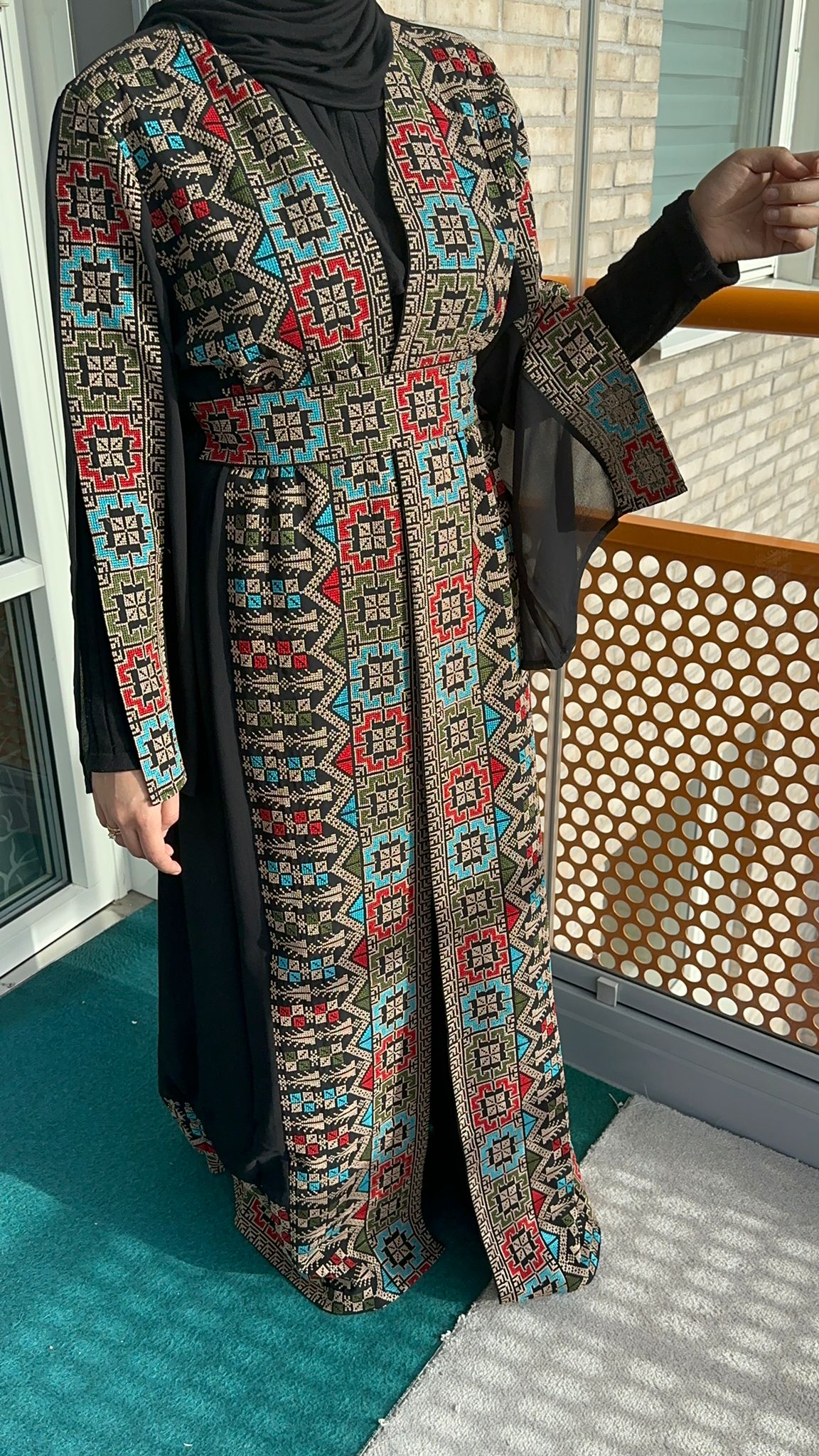 Black Chiffon Abaya with colorful traditional embroidery.