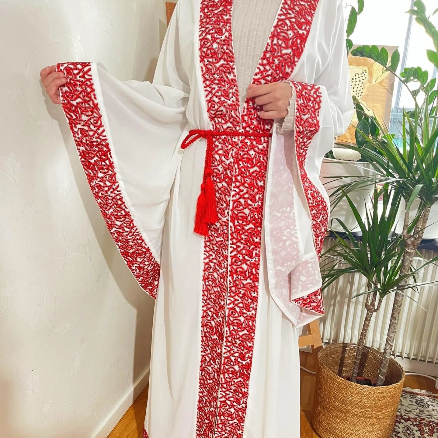 White Abaya beaded with Red traditional embroidery .