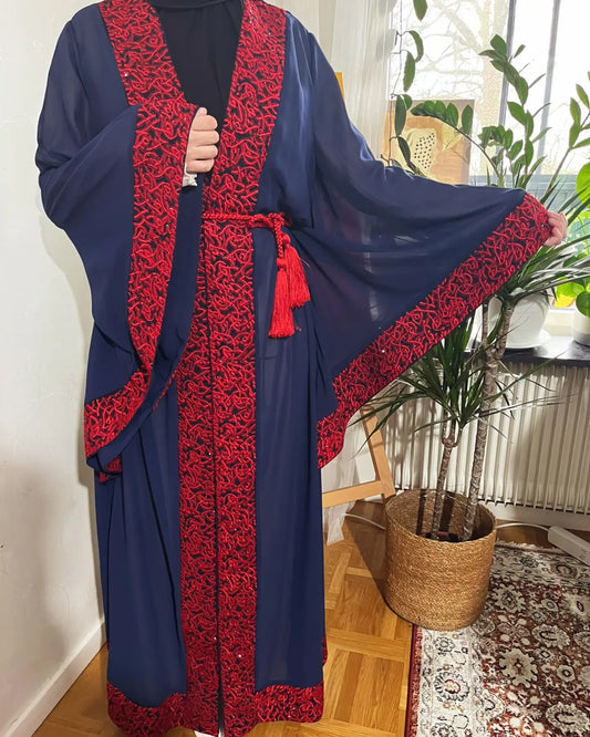 Royal blue Abaya beaded with Red traditional embroidery .